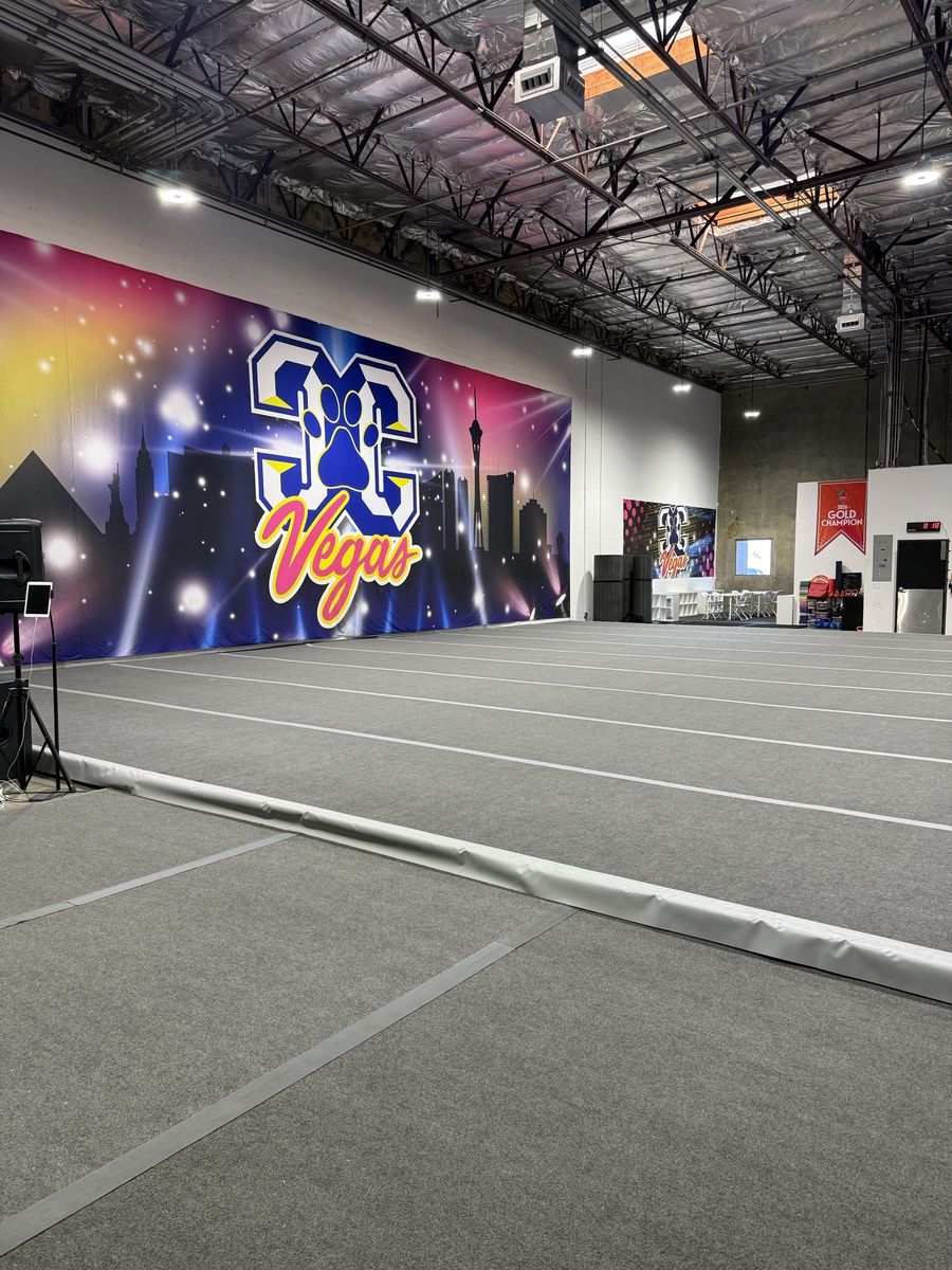 Large cheer mural wall beside the competition floor, CheerCats tenant improvement, Henderson NV