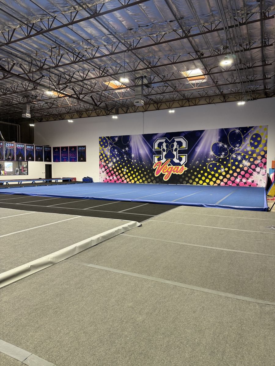 Gym overview with spring floor, mural wall and exposed joists, CheerCats tenant improvement, Henderson NV
