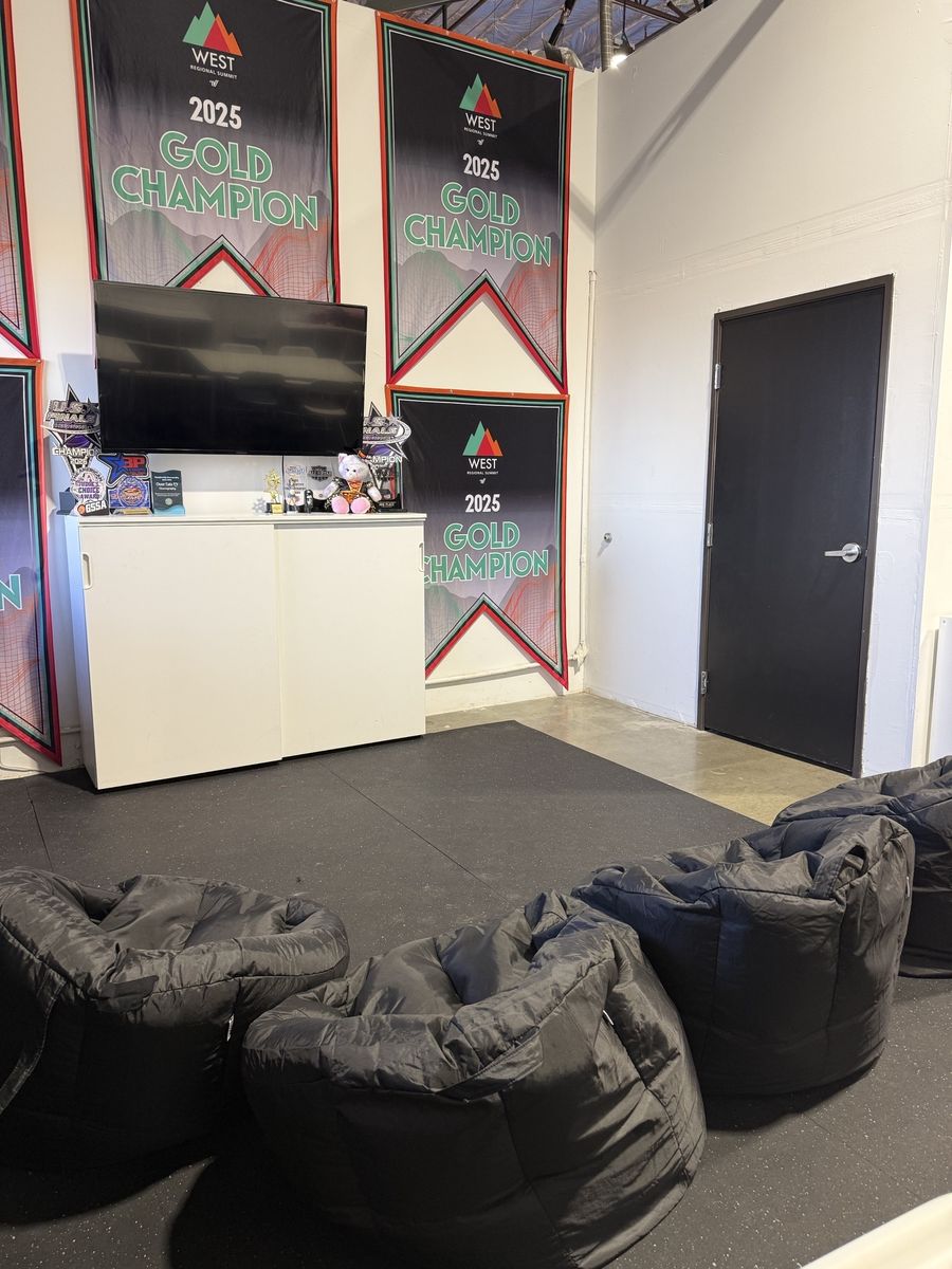 Lounge area with bean bags, TV and banners, CheerCats tenant improvement, Henderson NV