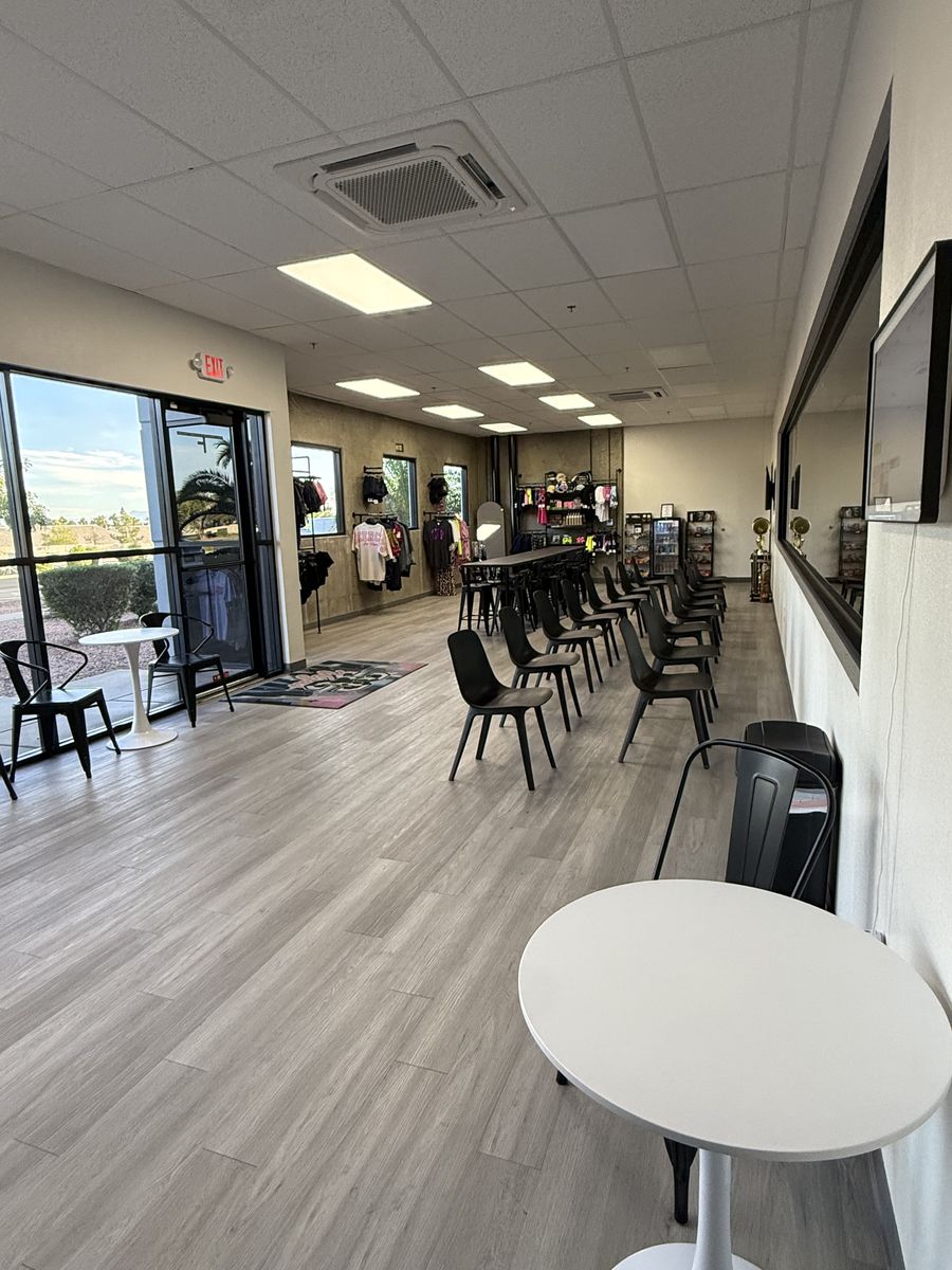 Lounge seating along gym viewing windows near the glass entry, LVP flooring, CheerCats tenant improvement, Henderson NV