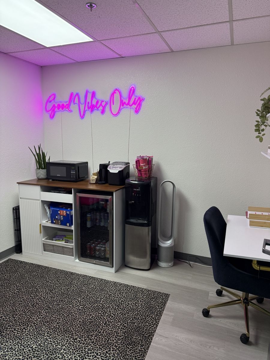 Staff room with neon sign, coffee station and desk, CheerCats tenant improvement, Henderson NV