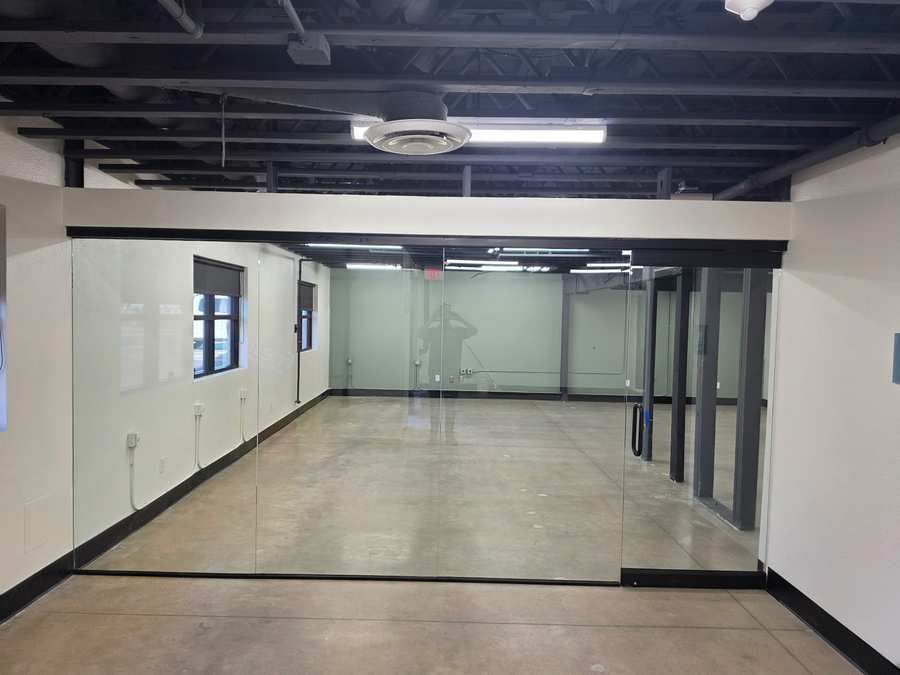 Frameless glass partition office suite in the Sustain Vegas tenant improvement, Las Vegas NV